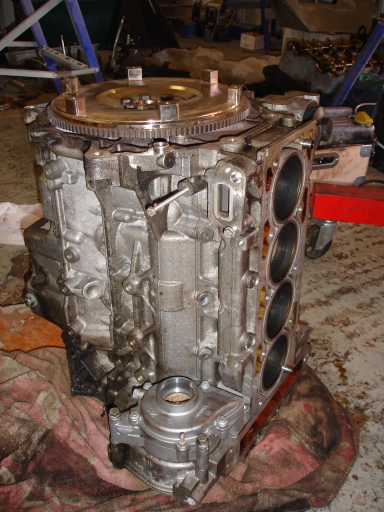ai1019.photobucket.com_albums_af312_2198cc_Newflywheelandwaterpump.jpg