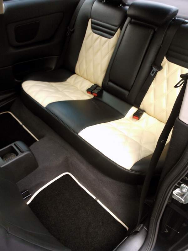 awww.illusional.co.uk_astra_pics_rear_seatsmats.jpg