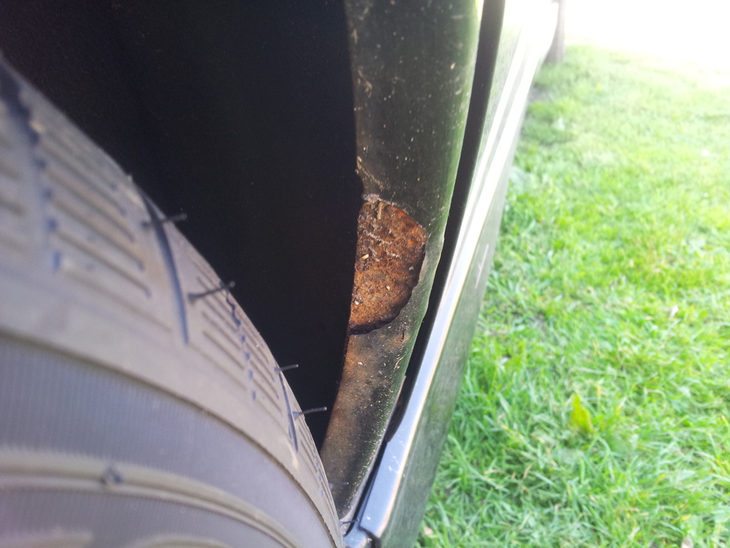 ai1149.photobucket.com_albums_o589_identiti66_Vectra_rust_20arch_201.jpg